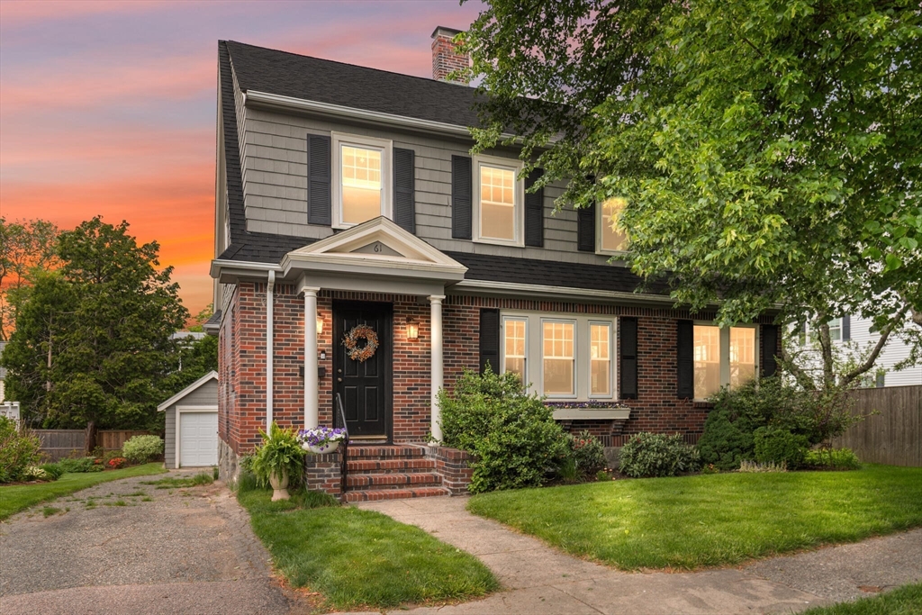 61 Howitt Road Boston, MA 02132 - Photo 2 of 42 a front view of a house with garden