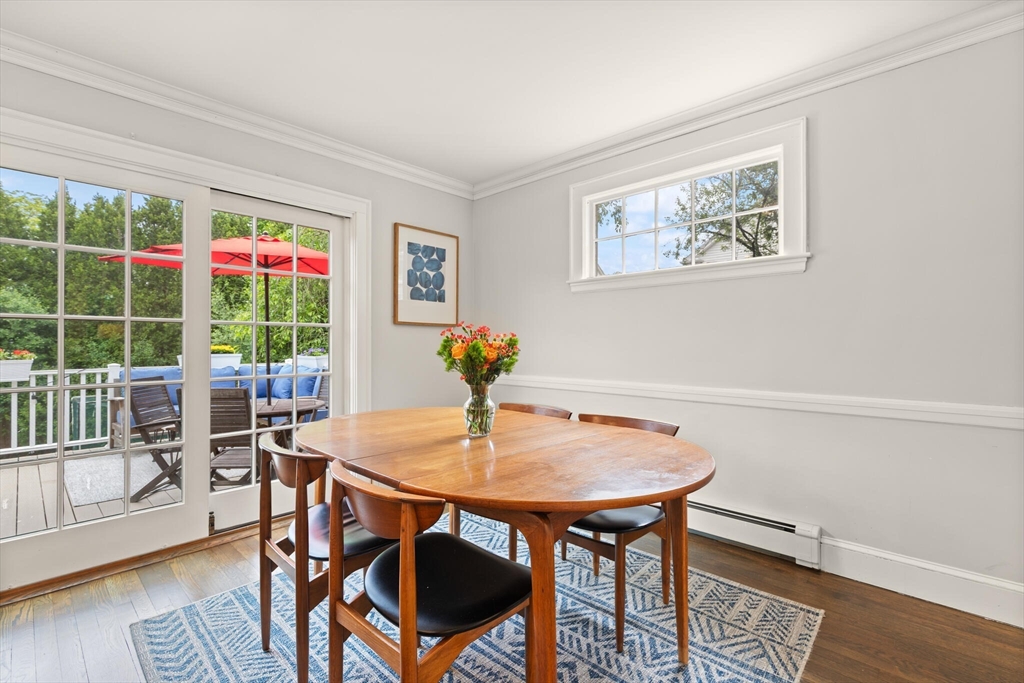 61 Howitt Road Boston, MA 02132 - Photo 22 of 42 a view of a dining room with furniture window and wooden floor