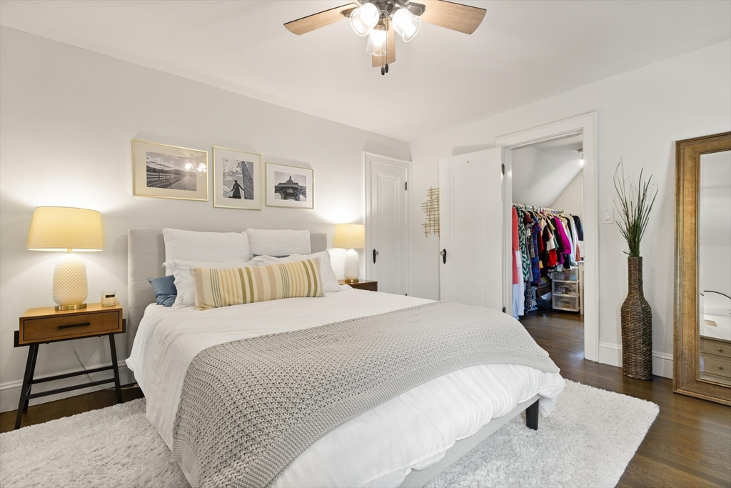 61 Howitt Road Boston, MA 02132 - Photo 24 of 42 a bed room with a bed and a walk in closet