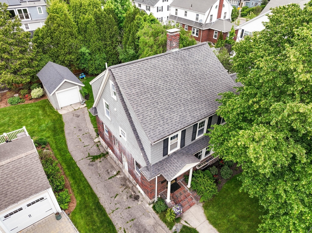 61 Howitt Road Boston, MA 02132 - Photo 38 of 42 a aerial view of a house with a yard