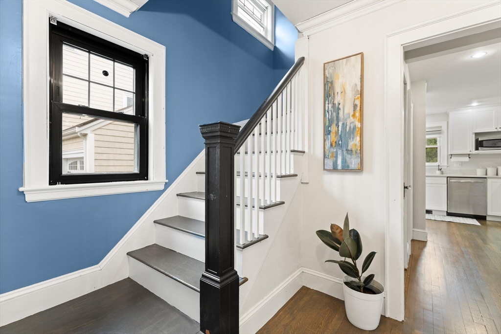 61 Howitt Road Boston, MA 02132 - Photo 5 of 42 a view of entryway and hall with wooden floor
