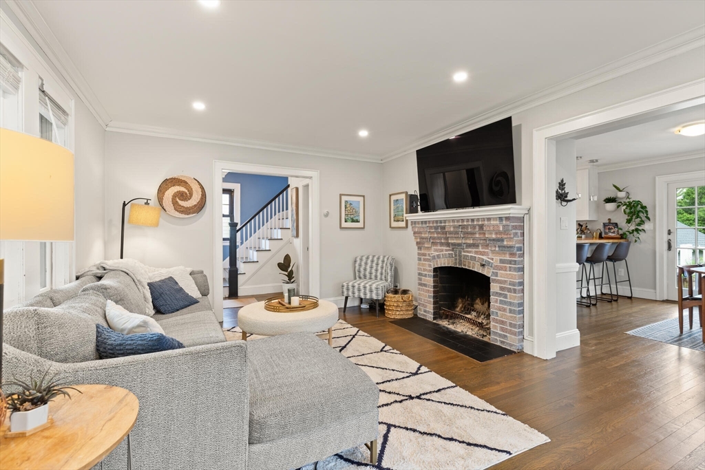 61 Howitt Road Boston, MA 02132 - Photo 7 of 42 a living room with furniture fireplace and flat screen tv