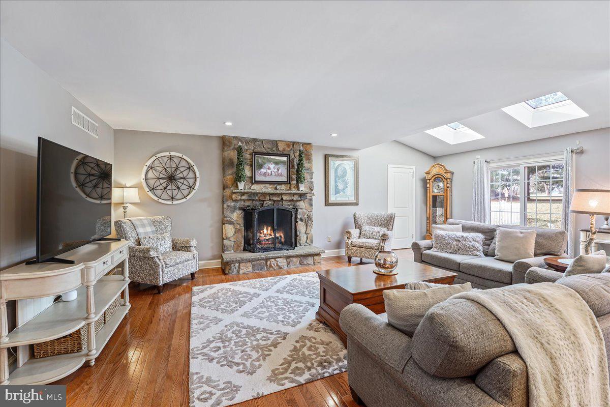 2228 Locust Drive Lansdale, PA 19446 - Photo 12 of 57 Great Room with gas fireplace and skylights