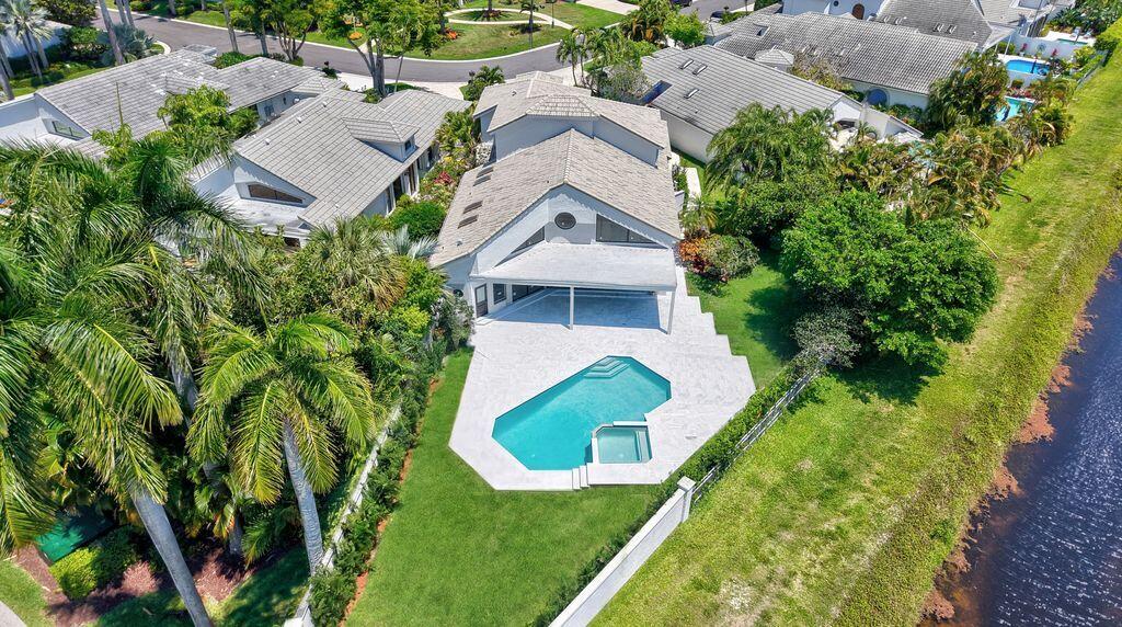 2105 Northwest 60th Circle Boca Raton, FL 33496 - Photo 2 of 2 an aerial view of house with yard