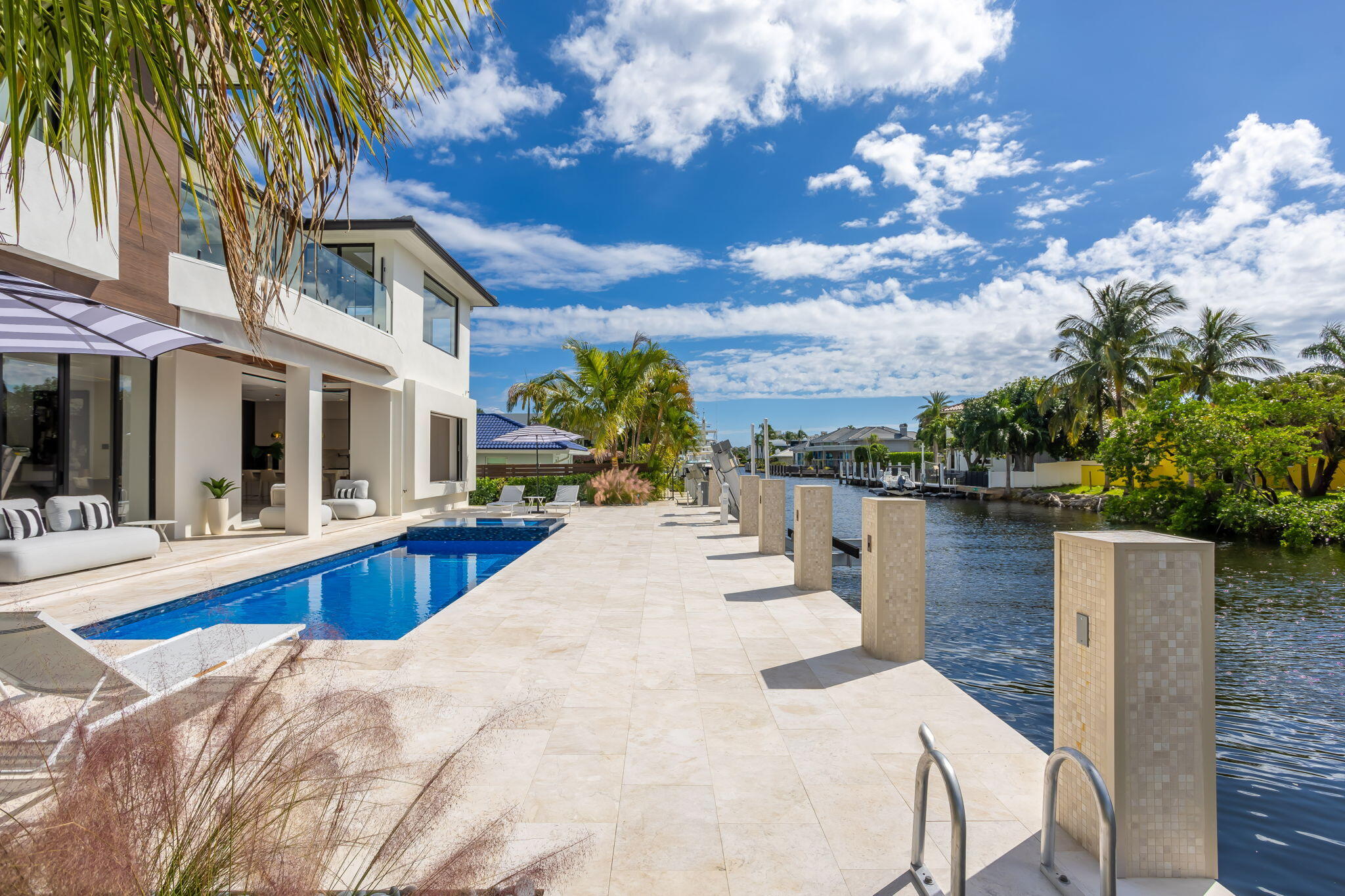 a view of a swimming pool with a patio