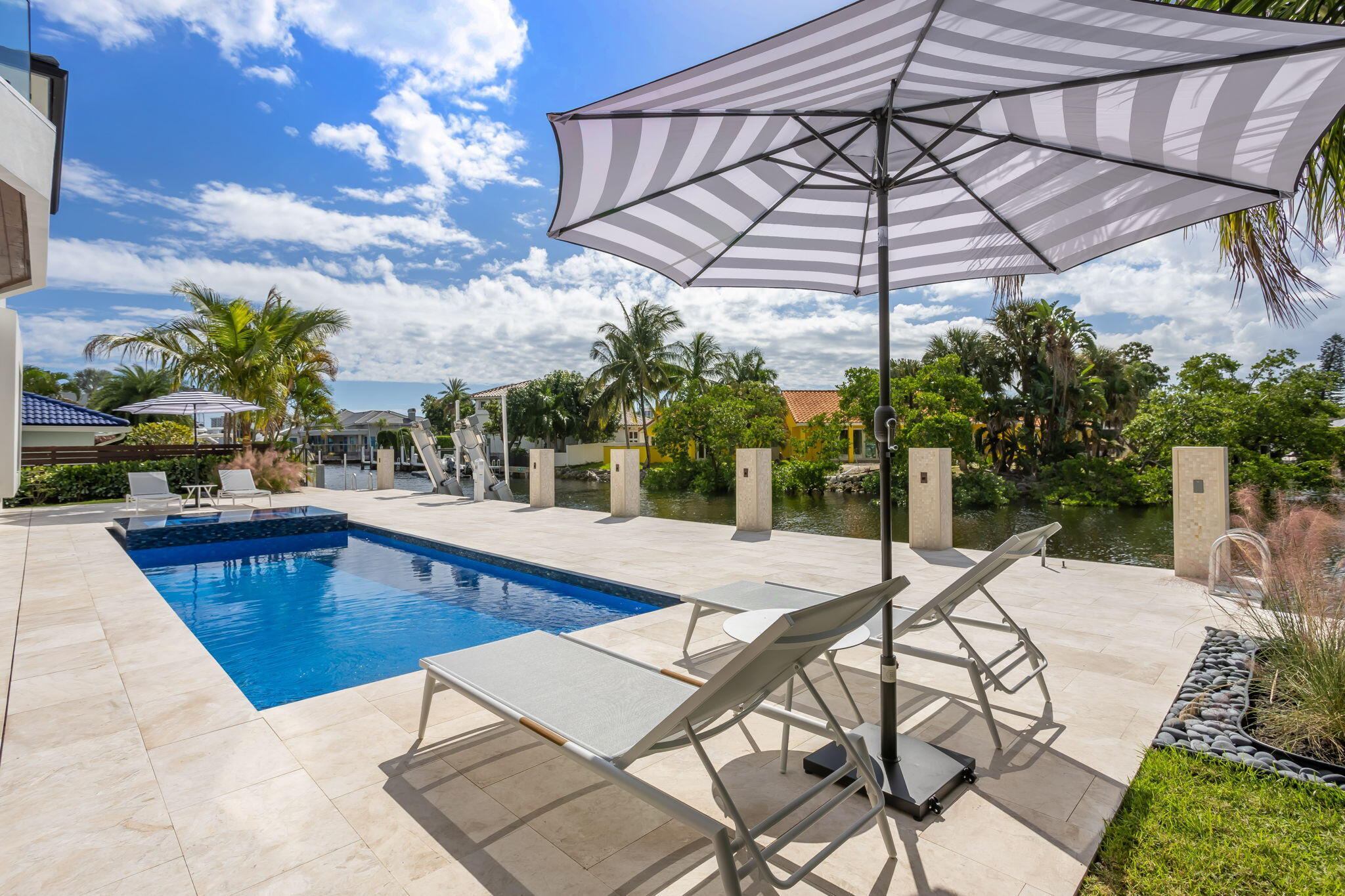 798 Havana Drive Boca Raton, FL 33487 - Photo 21 of 76 a view of a swimming pool with a patio