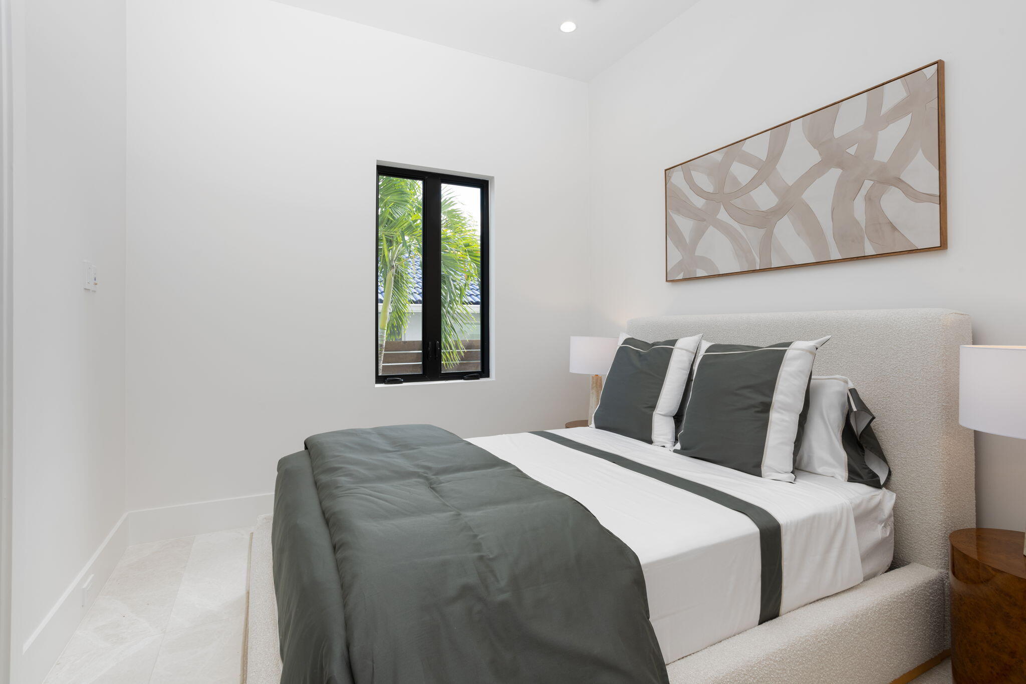 798 Havana Drive Boca Raton, FL 33487 - Photo 29 of 76 a bed room with a bed and a painting on the wall