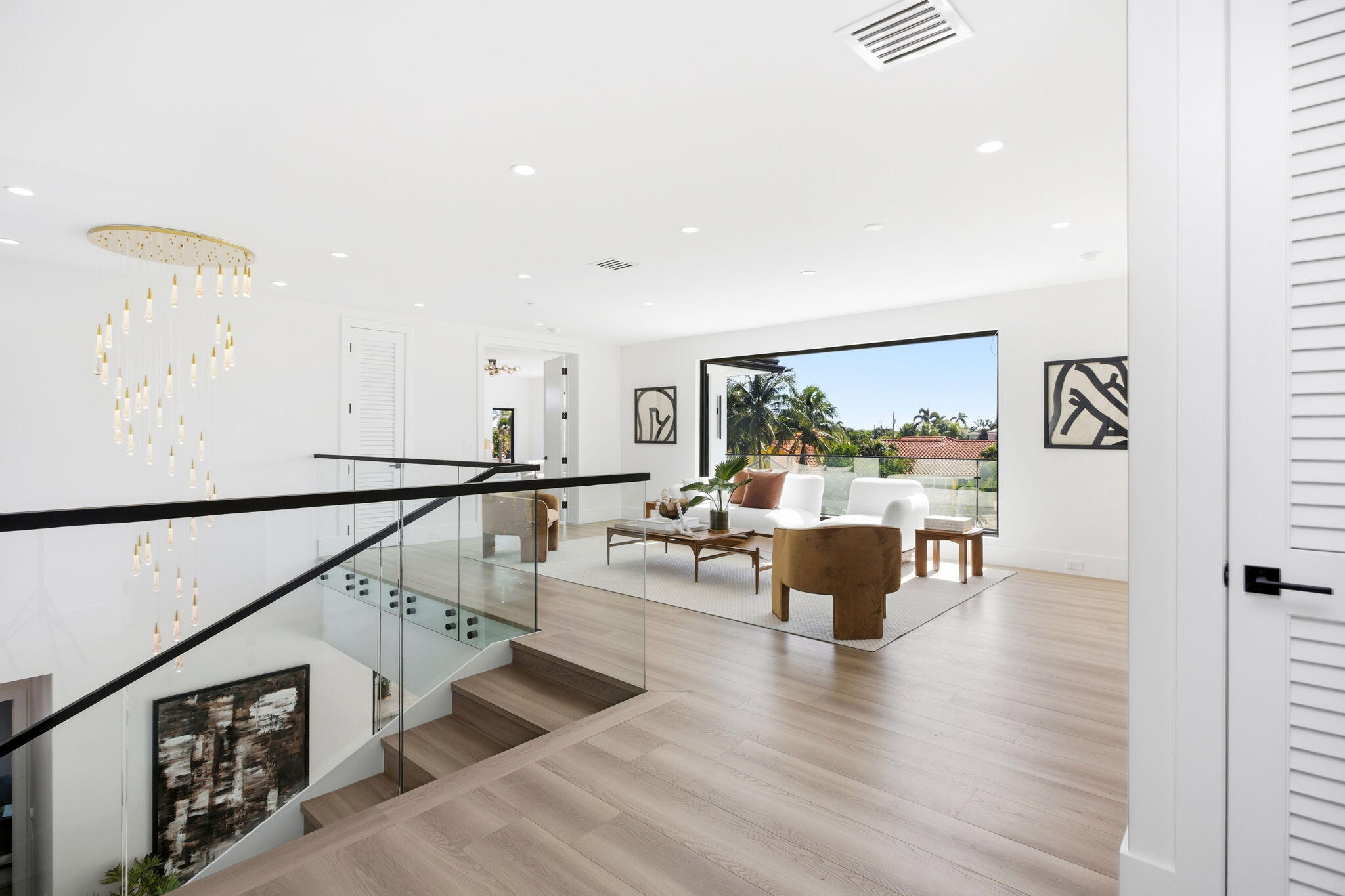 798 Havana Drive Boca Raton, FL 33487 - Photo 32 of 76 a living room with furniture and a large window
