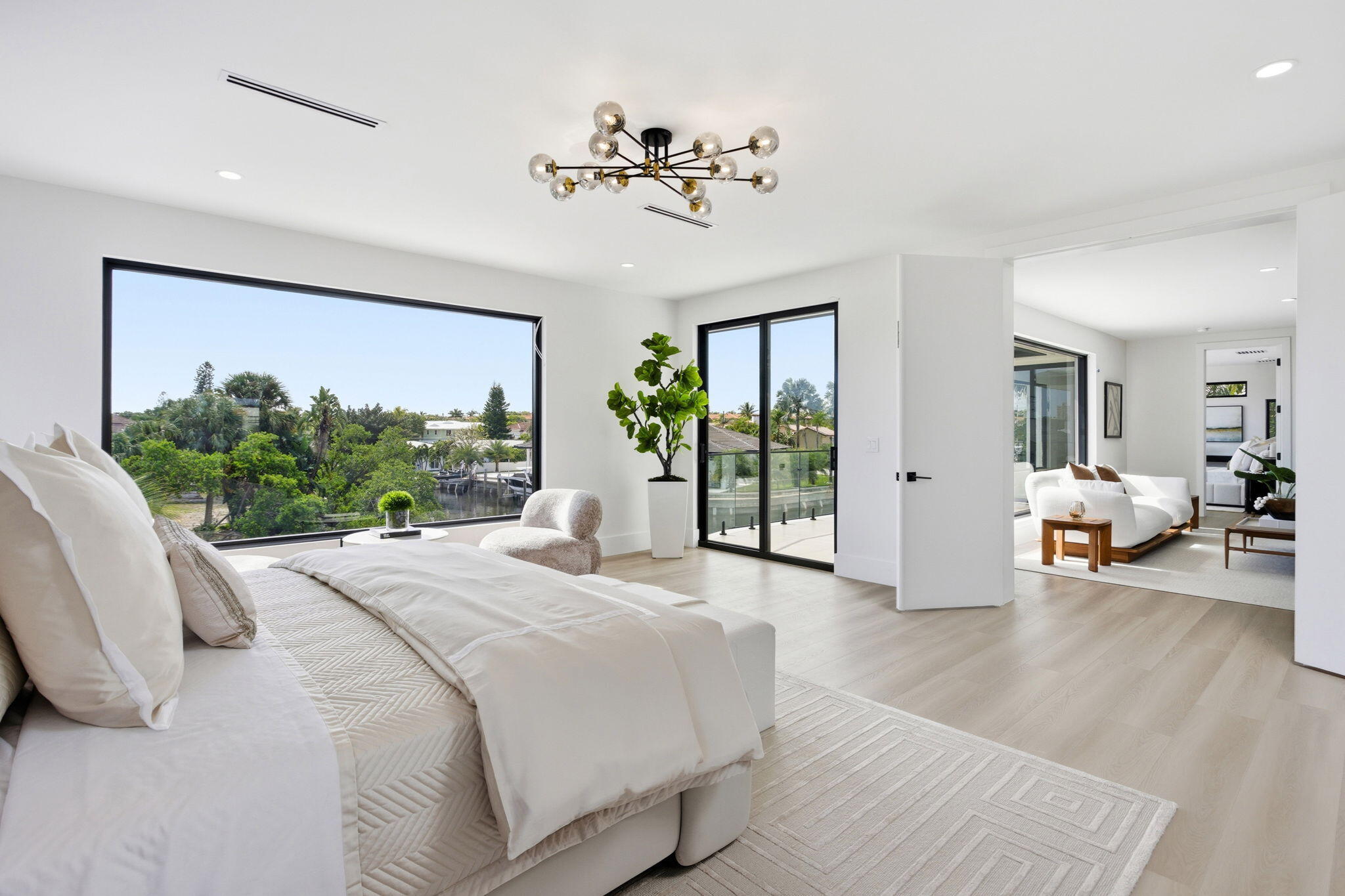 798 Havana Drive Boca Raton, FL 33487 - Photo 34 of 76 a spacious bedroom with a large bed and a large window