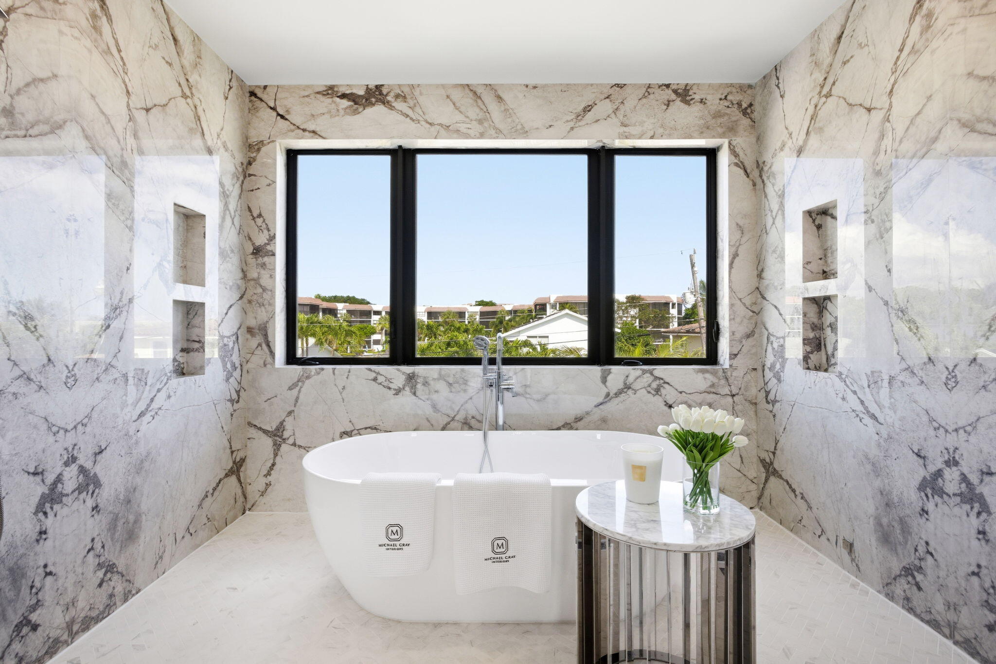 798 Havana Drive Boca Raton, FL 33487 - Photo 38 of 76 a white bath tub sitting in a bathroom next to a window