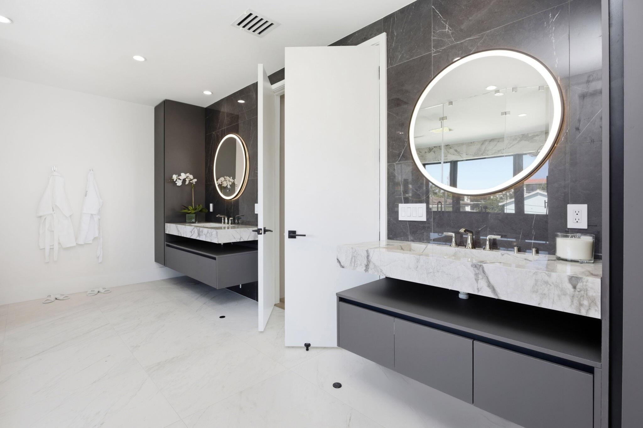 798 Havana Drive Boca Raton, FL 33487 - Photo 39 of 76 a bathroom with a double vanity sink and a mirror