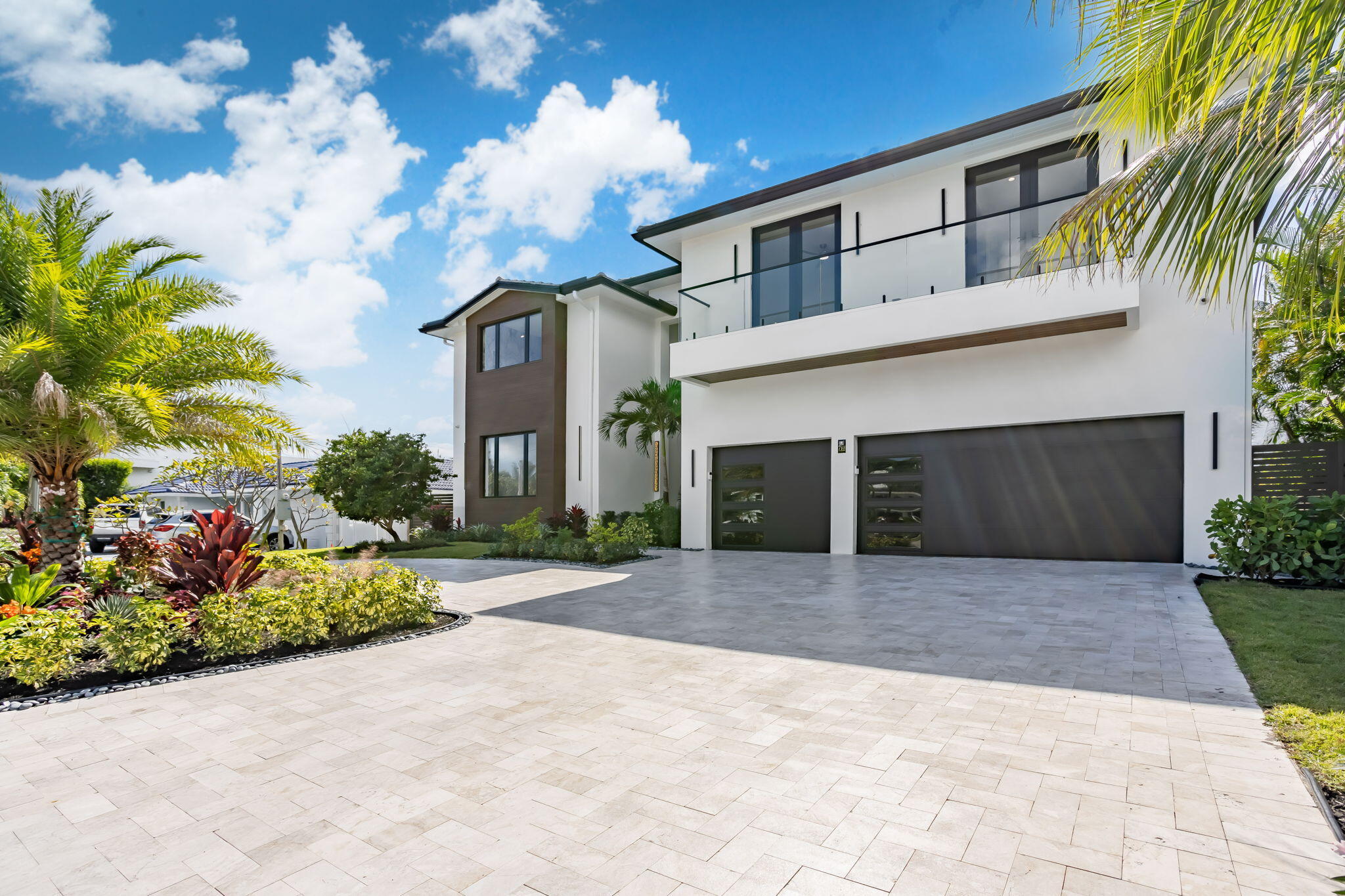 798 Havana Drive Boca Raton, FL 33487 - Photo 56 of 76 a front view of a house with a yard and garage