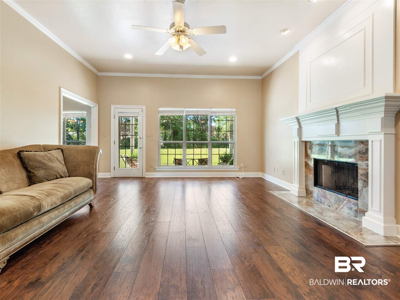 9886 Merritt Court Fairhope, AL 36532 - Photo 16 of 39 New engineered wood floors in main living areas