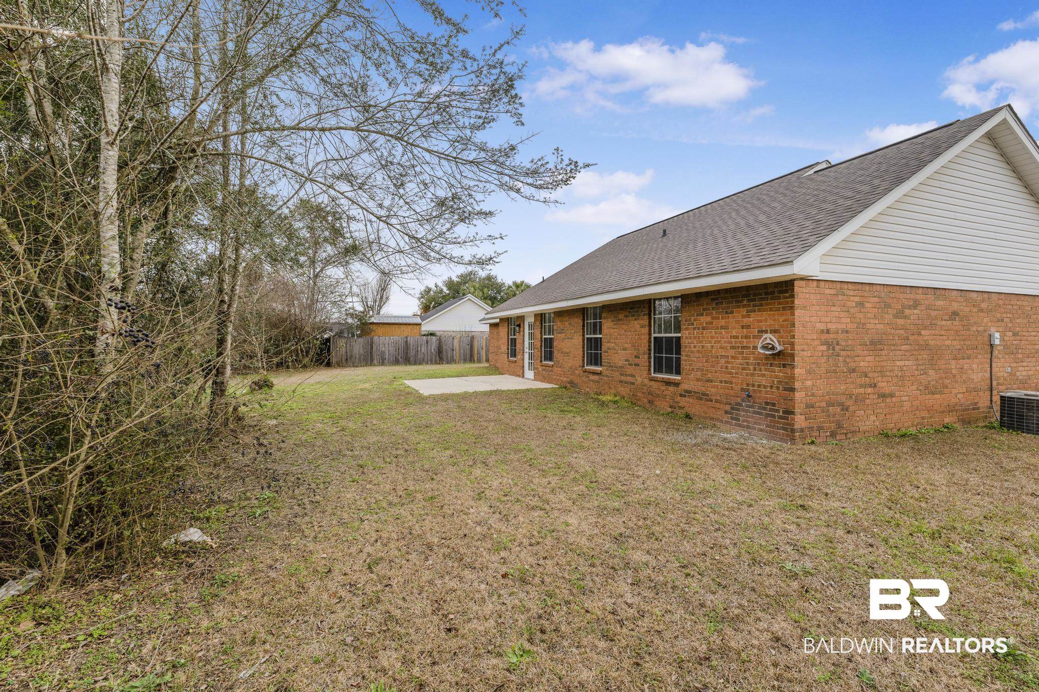 16330 Absalom Street Foley, AL 36535 - Photo 9 of 42 View of yard with a patio