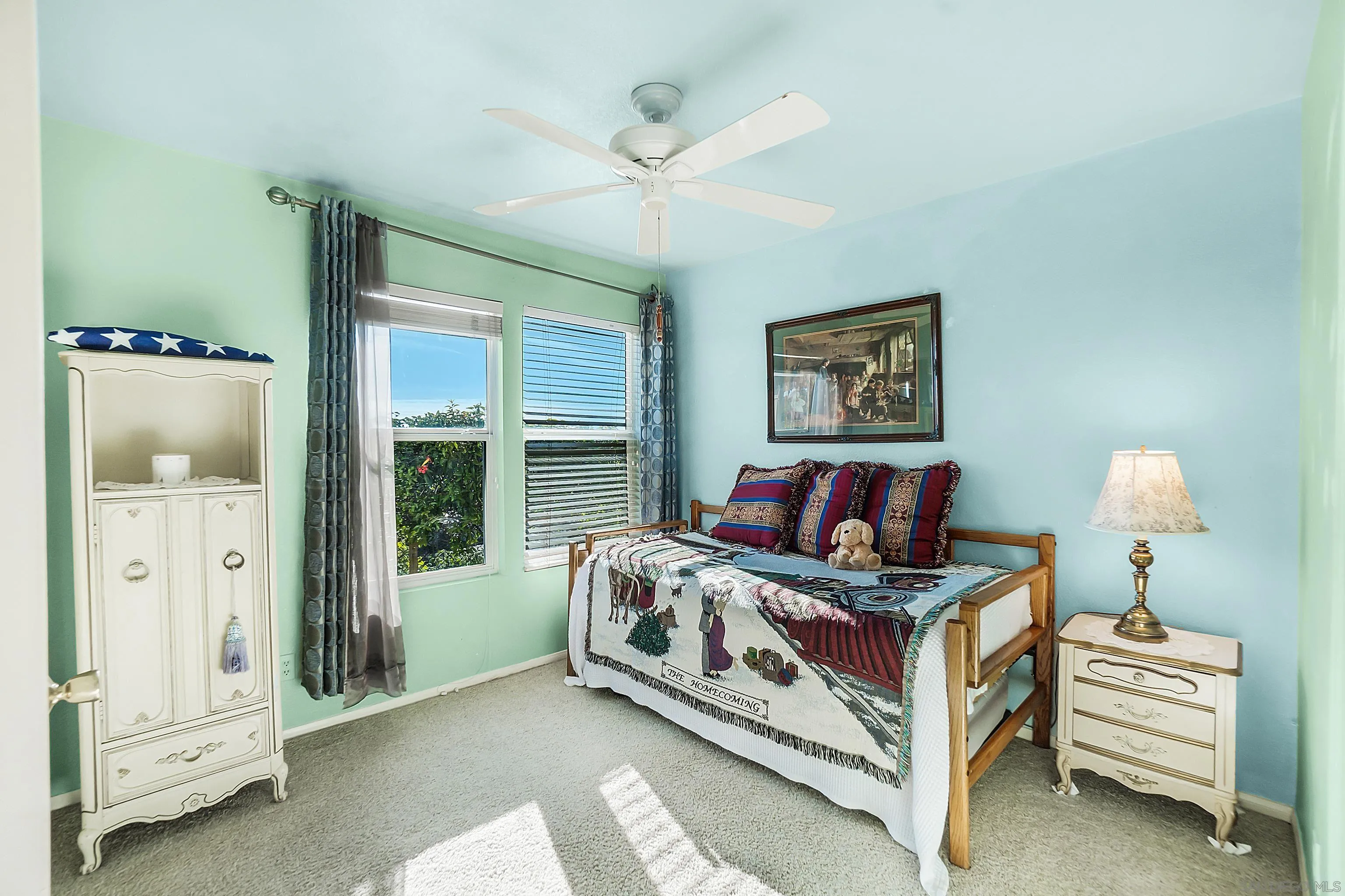 2069 Boulders Road Alpine, CA 91901 - Photo 3 of 13 a bed sitting in a bedroom next to a window