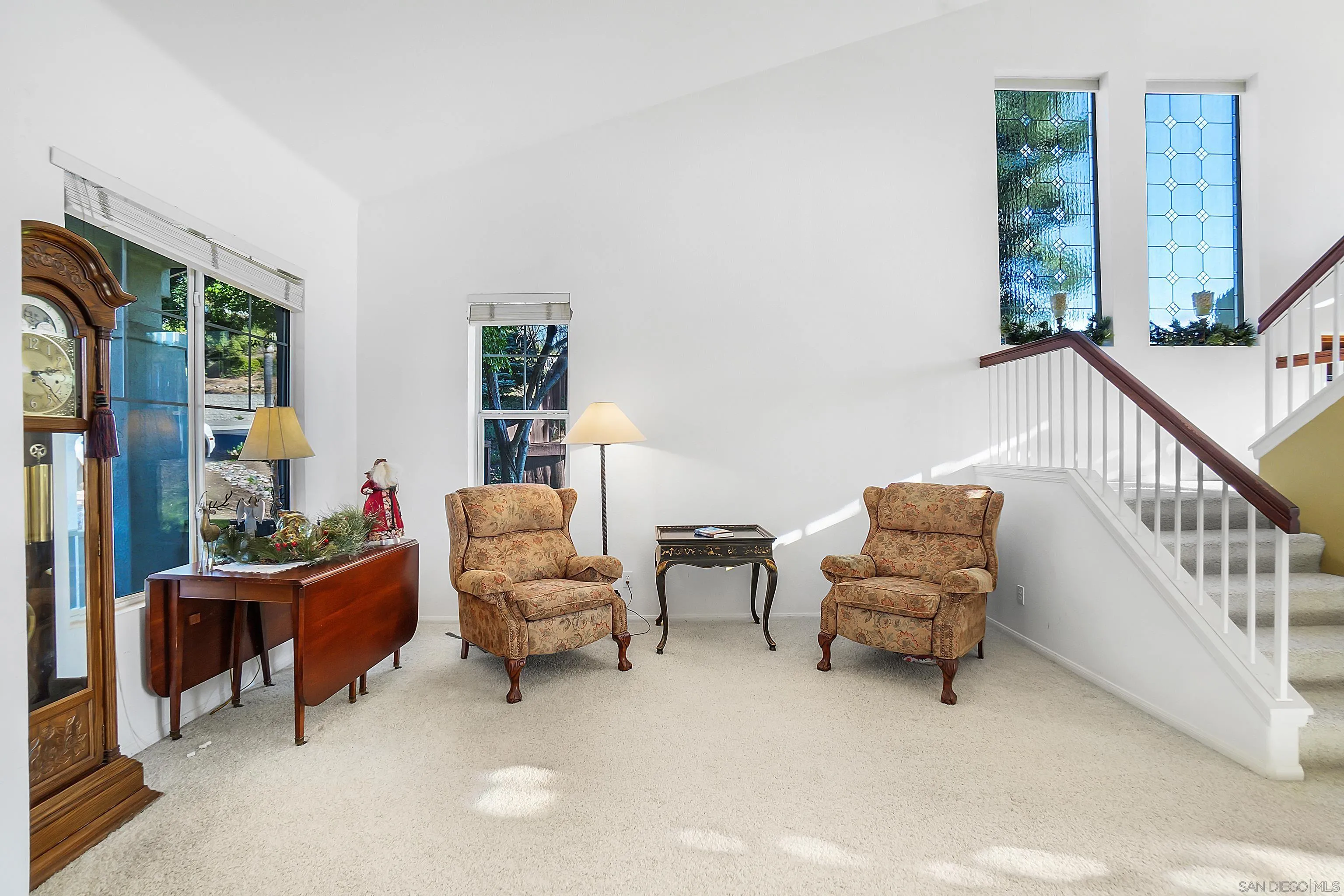 2069 Boulders Road Alpine, CA 91901 - Photo 9 of 13 a living room with furniture and a window