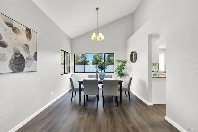 a dining room with furniture window wooden floor