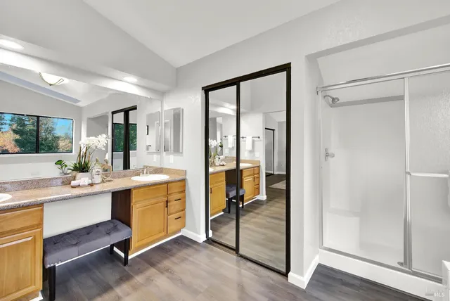 a view of a walk in closet and a window