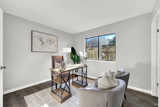 a workspace with furniture and window