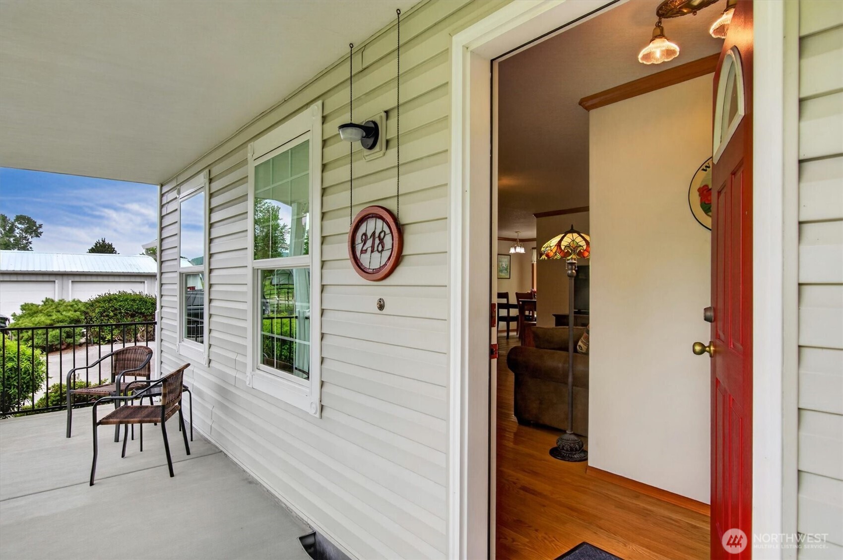 218 West Sunny Sands Road Cathlamet, WA 98612 - Photo 6 of 40 a view of a door and chair in the room