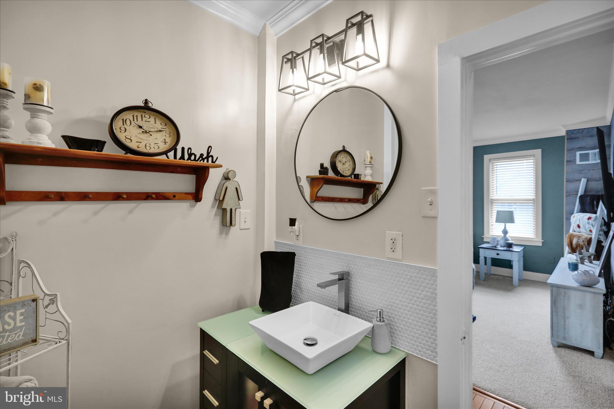 50 East 2nd Avenue Lititz, PA 17543 - Photo 11 of 35 a view of a hallway with elevator stove and a mirror