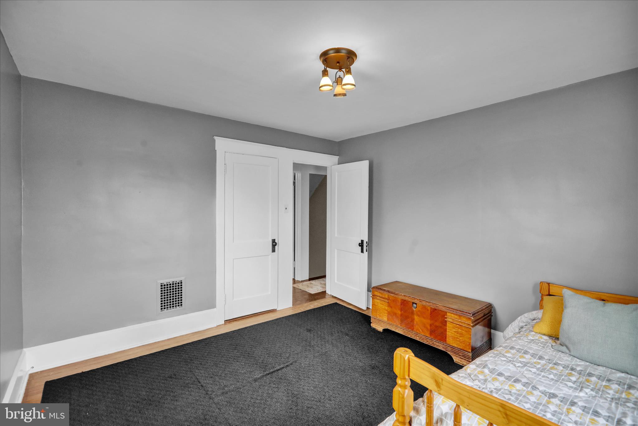 50 East 2nd Avenue Lititz, PA 17543 - Photo 22 of 35 a blue bed sitting in a room next to a window