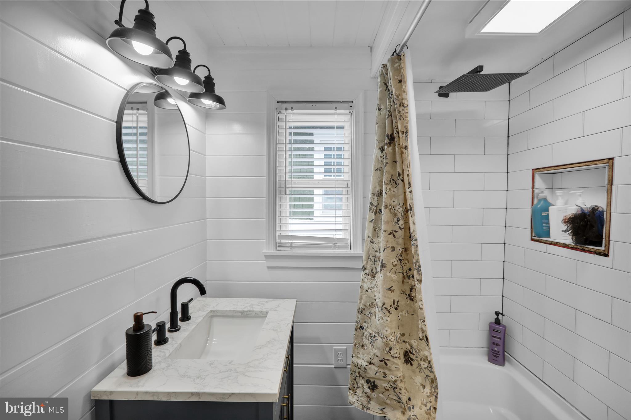 50 East 2nd Avenue Lititz, PA 17543 - Photo 27 of 35 a bathroom with a sink a toilet and shower