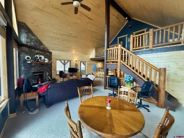 a view of a patio with couches table and chairs