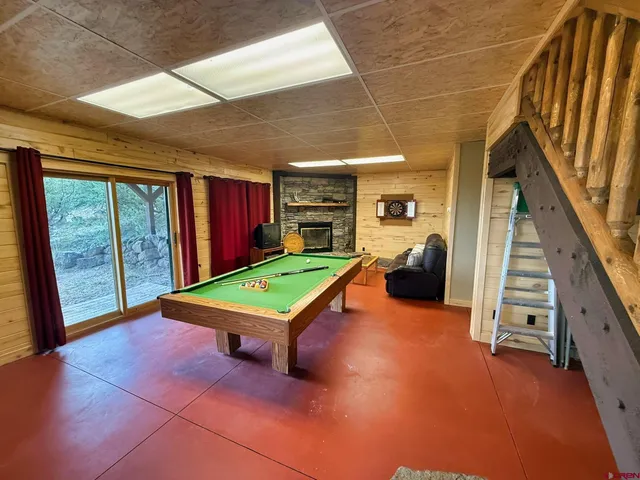 a room with furniture and a large window