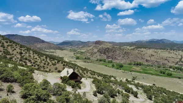 a view of lake with mountain