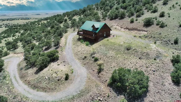 a view of a wooden floor with a yard
