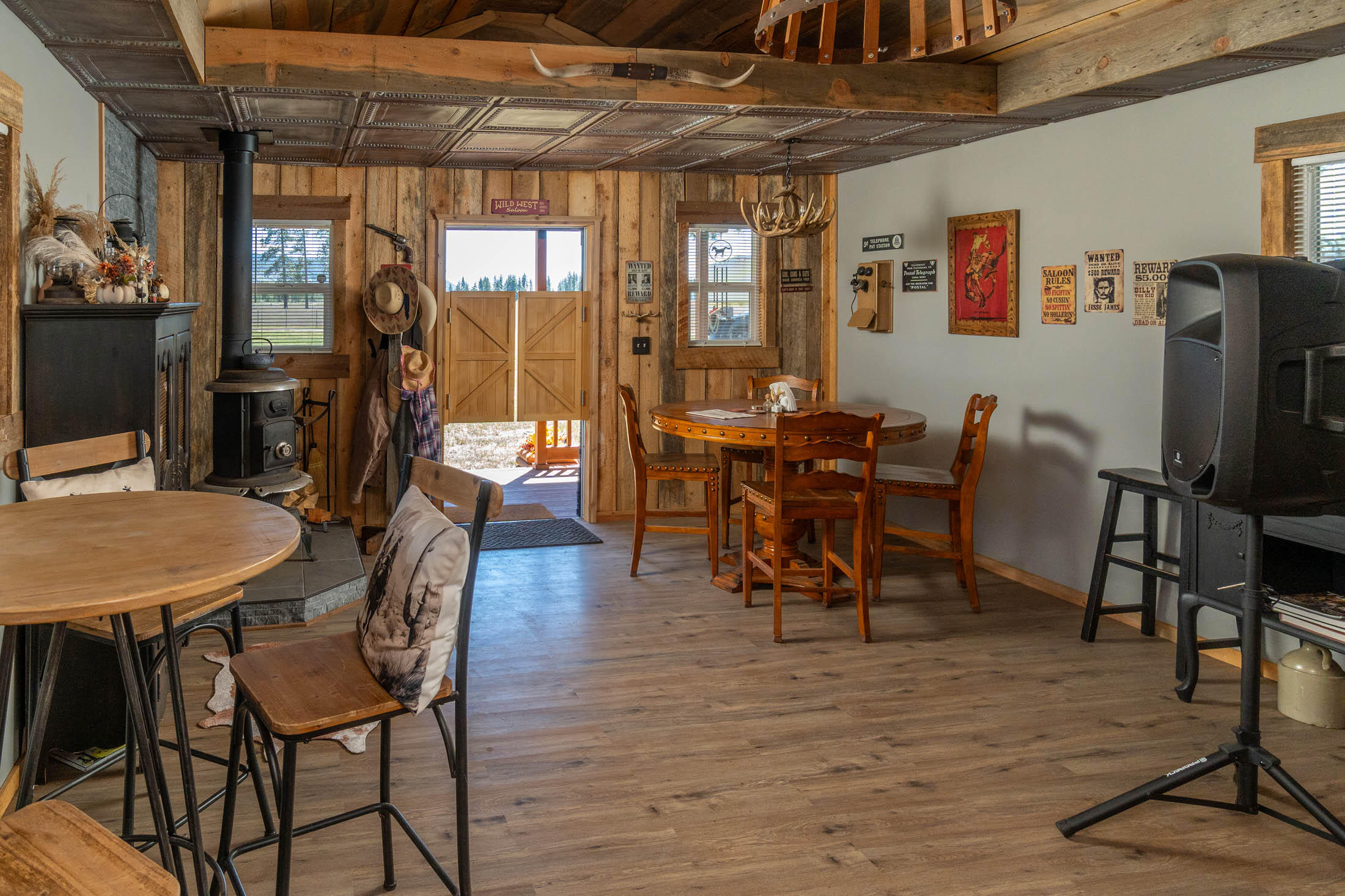 32907 River Bend Road Chiloquin, OR 97624 - Photo 49 of 83 a view of a dining room with furniture window and wooden floor