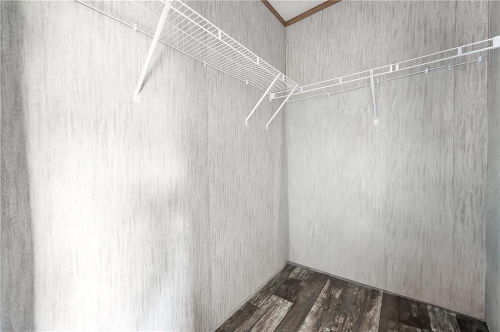 69 South Summit Road, Unit 102 Greenville, PA 16125 - Photo 16 of 24 a view of a room with racks on the wall