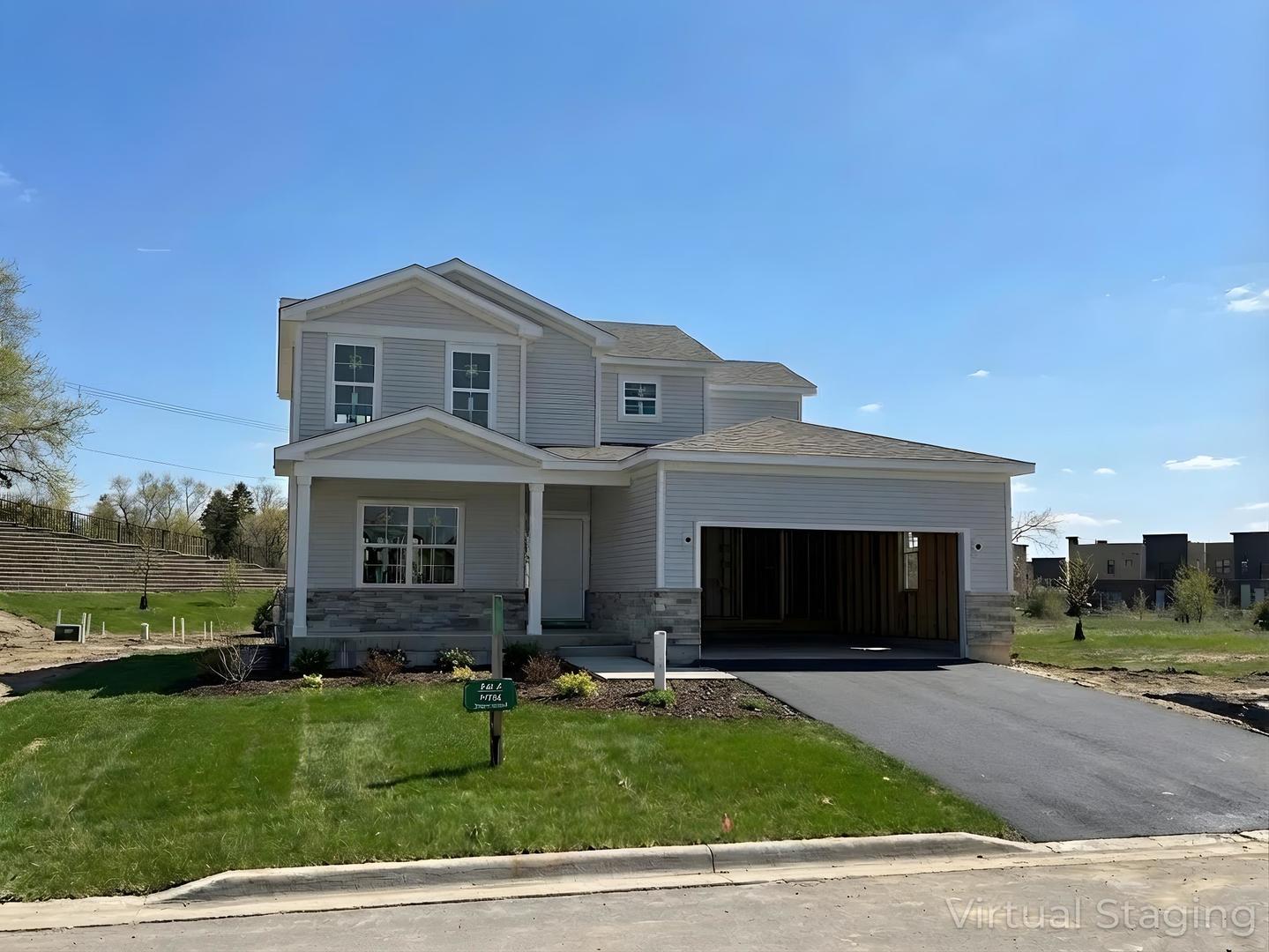 11725 Ryann Road Huntley, IL 60142 - Photo 1 of 4 a front view of a house with a yard