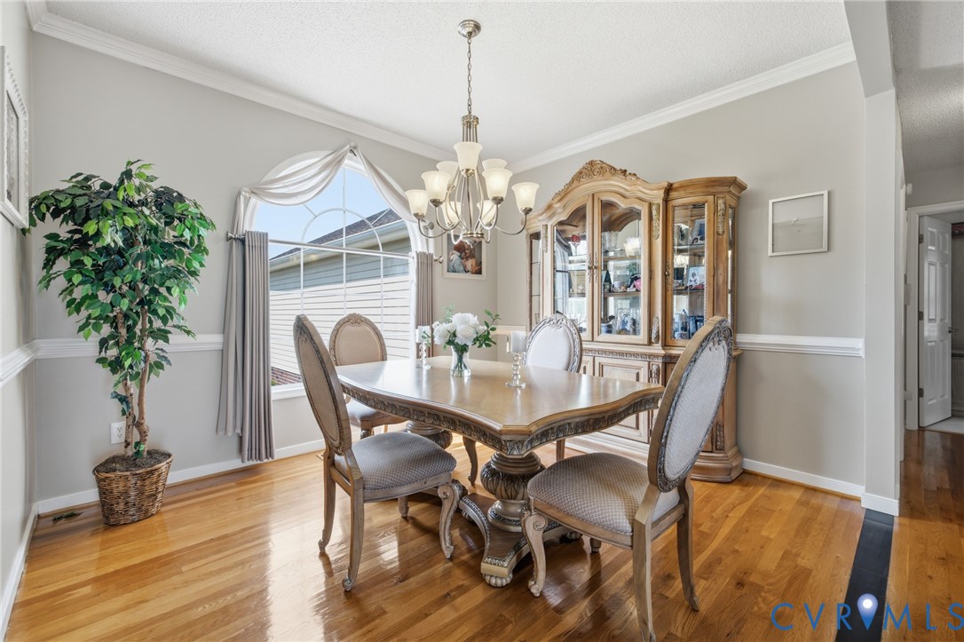 15300 Lebanon Road Spring Grove, VA 23881 - Photo 8 of 41 Spacious dining room with beautiful hardwood floor