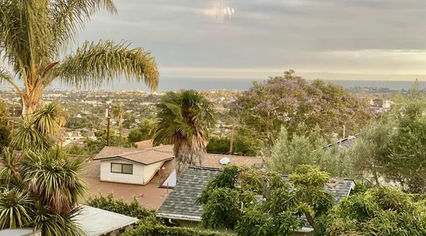 a view of a city with ocean view