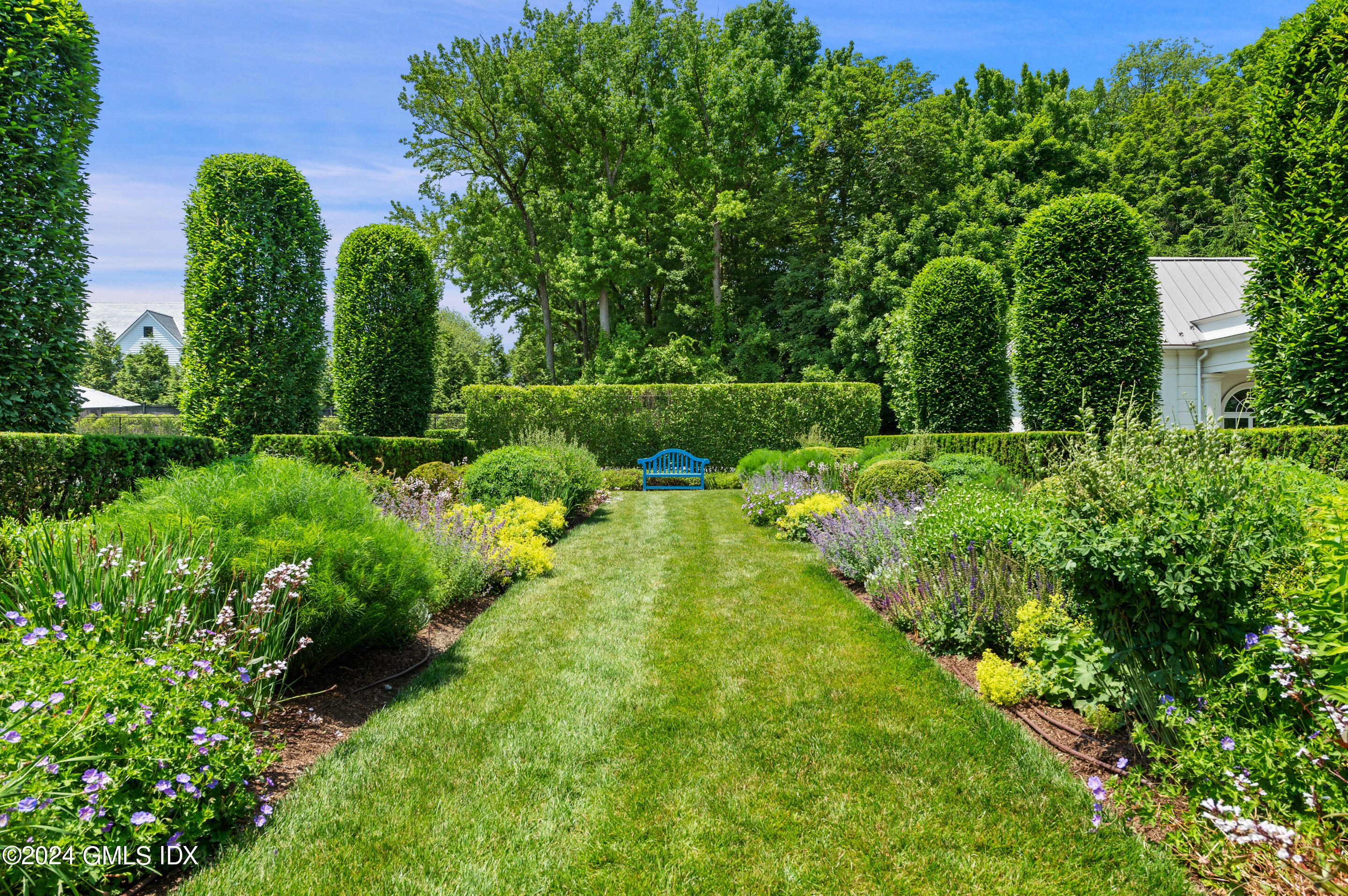 537 North Street Greenwich, CT 06830 - Photo 20 of 27 a view of a garden