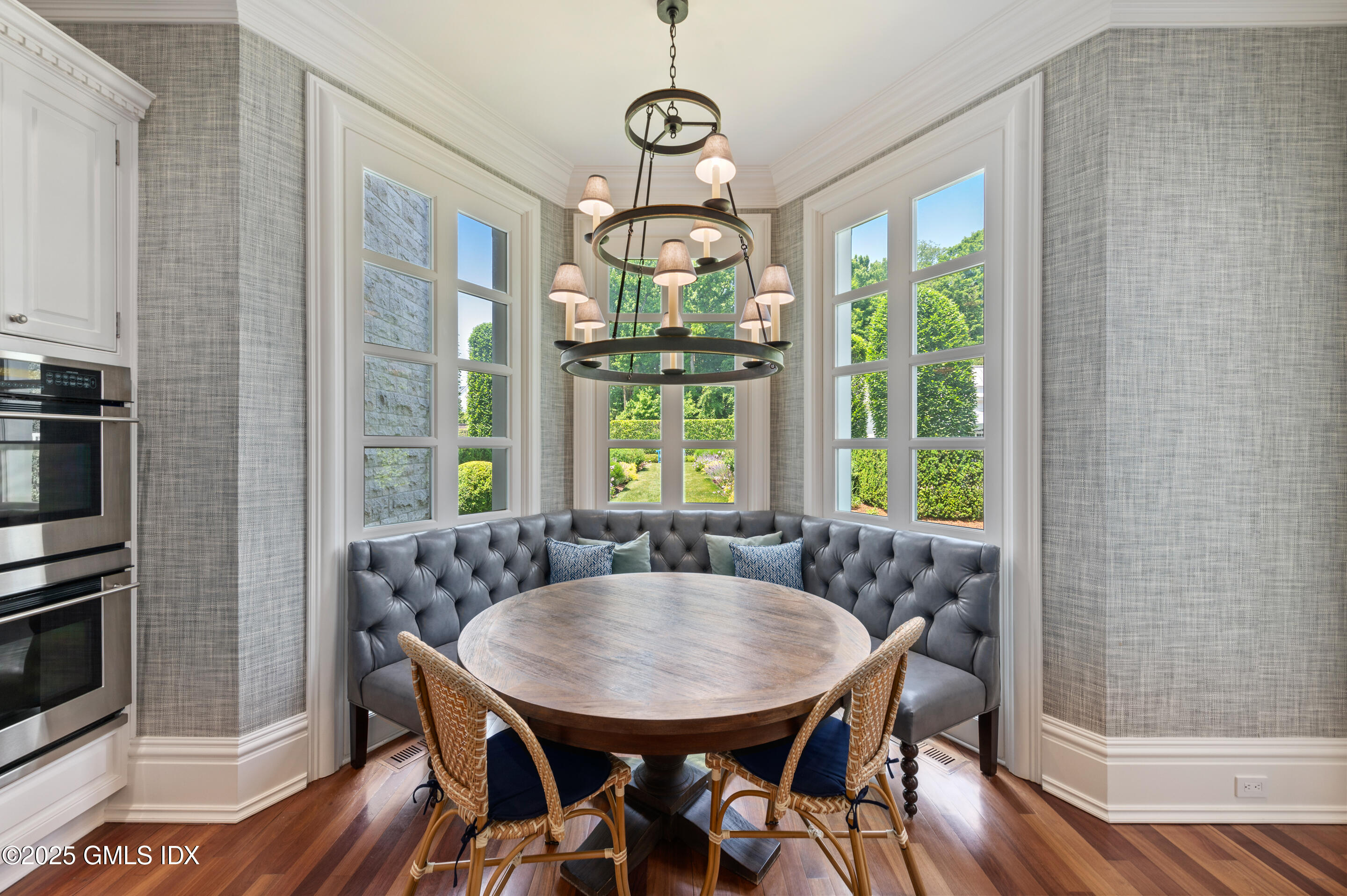 537 North Street Greenwich, CT 06830 - Photo 10 of 27 a view of a dining room with furniture window and wooden floor