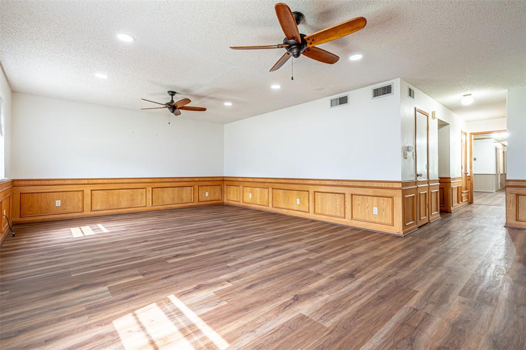 501 Endora Dublin, TX 76446 - Photo 9 of 39 a view of a room with wooden floor