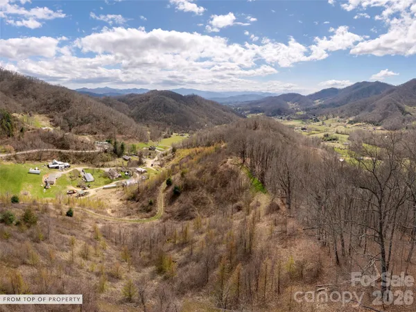 a view of mountains and valleys