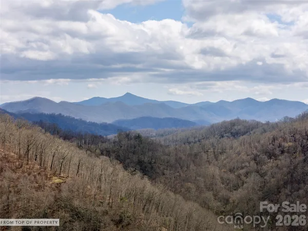a view of mountains and valleys