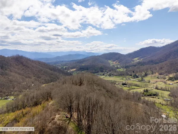 a view of mountains and valleys