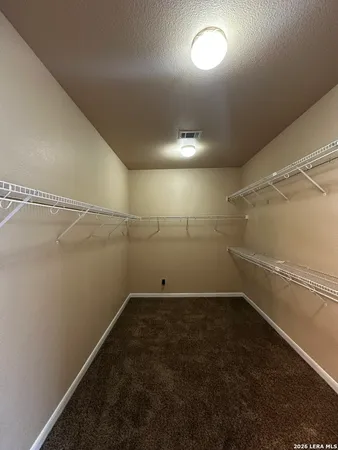 a view of a room with an empty space