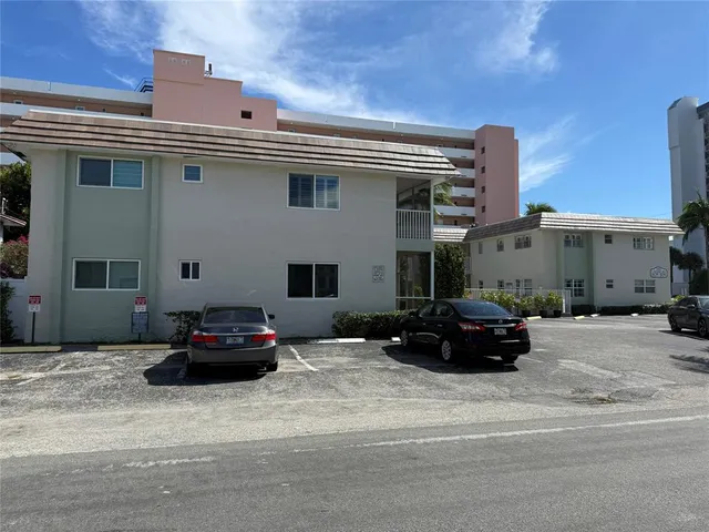 a car parked in front of a building