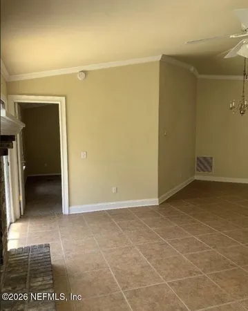 a view of a room with an empty space