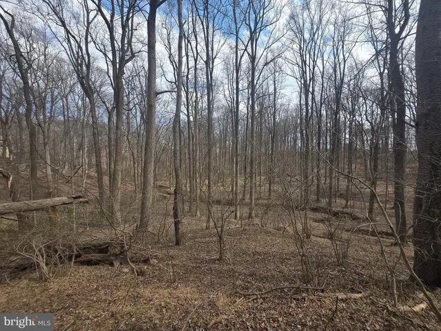 a stone house with a outdoor space
