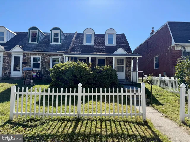a front view of a house with a porch