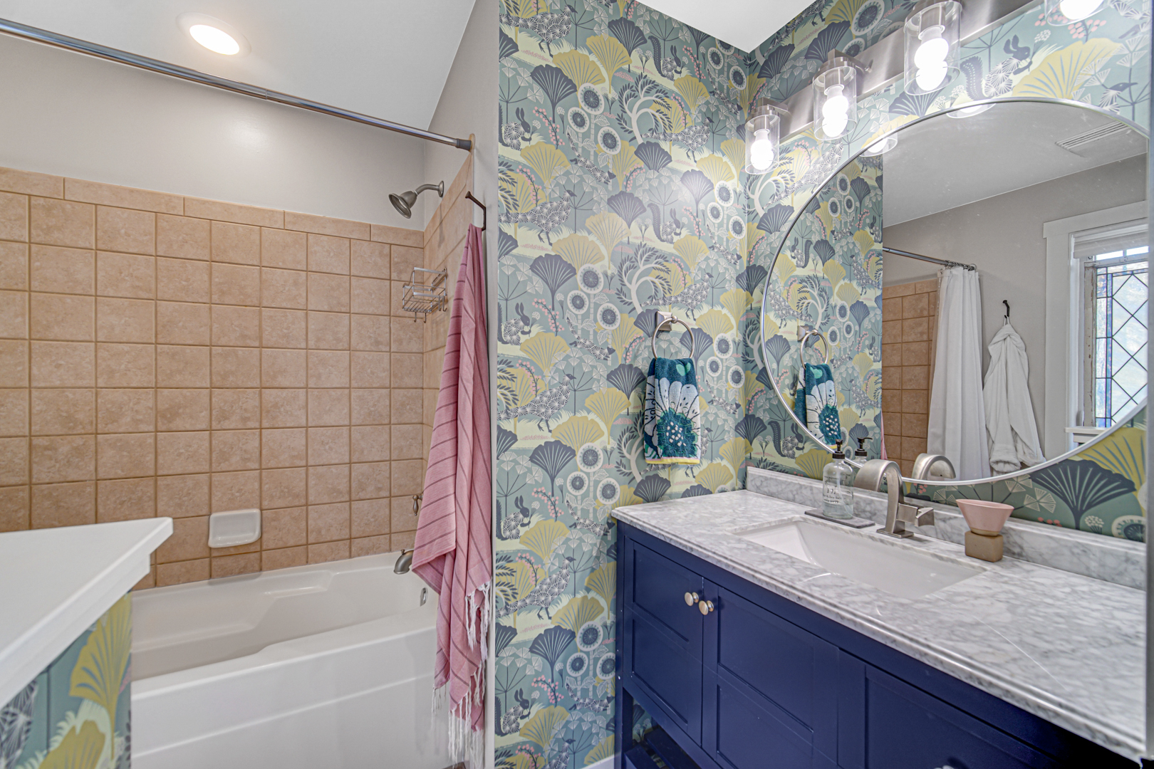 1024 Harris Road Grayslake, IL 60030 - Photo 30 of 68 a bathroom with a granite countertop sink a toilet a bathtub and shower