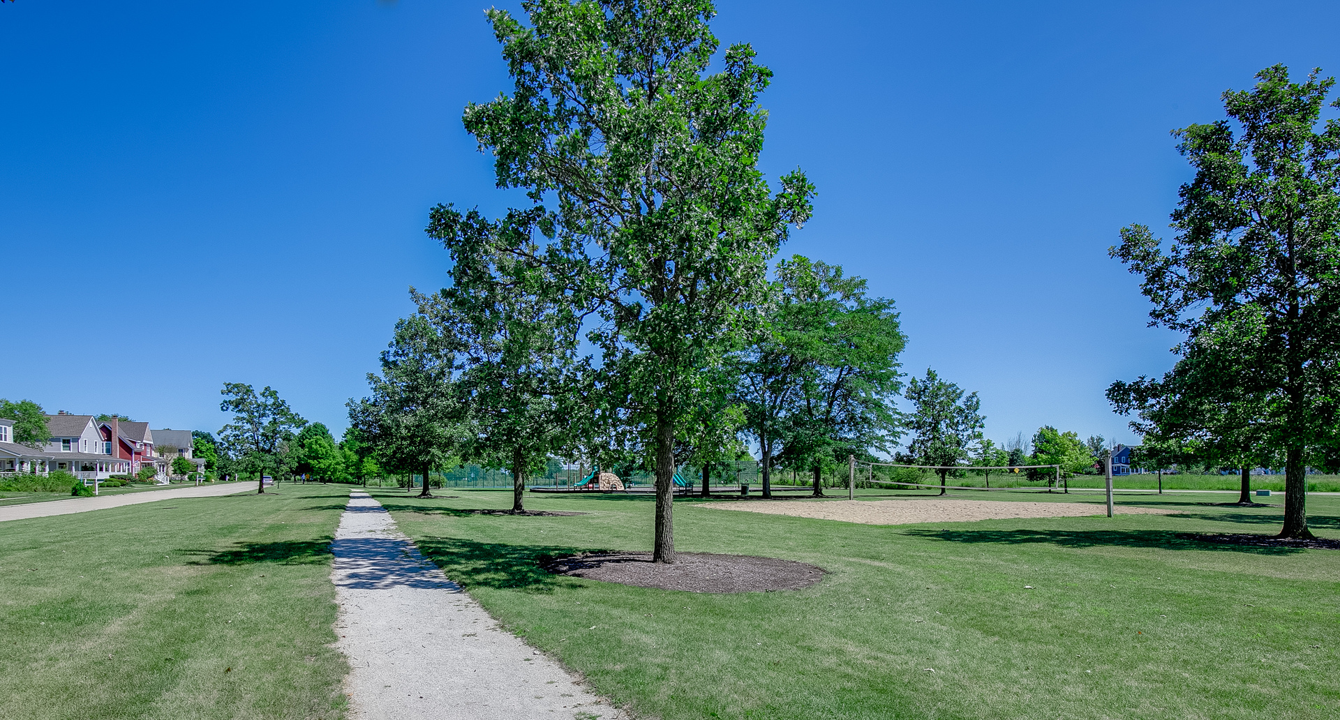 1024 Harris Road Grayslake, IL 60030 - Photo 52 of 68 a green field with lots of trees in the background