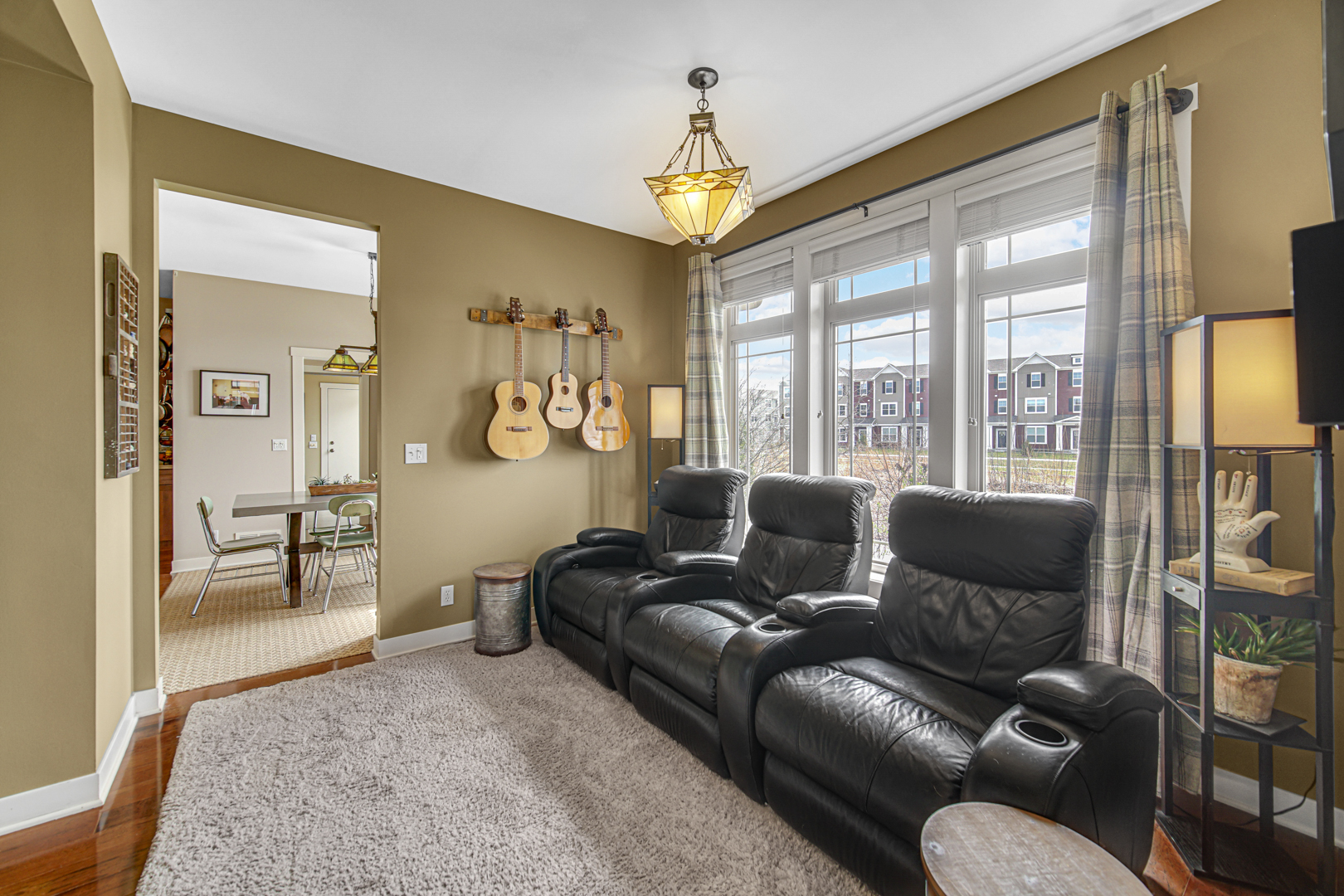 1024 Harris Road Grayslake, IL 60030 - Photo 9 of 68 a living room with furniture and a chandelier